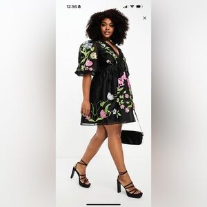 Black dress with embroidered floral
